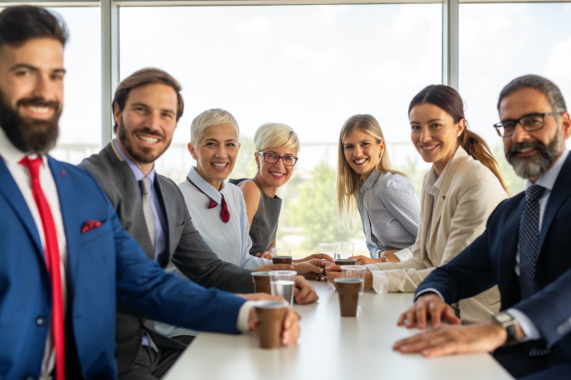 Portrait Of Successful Business Team Posing In Office